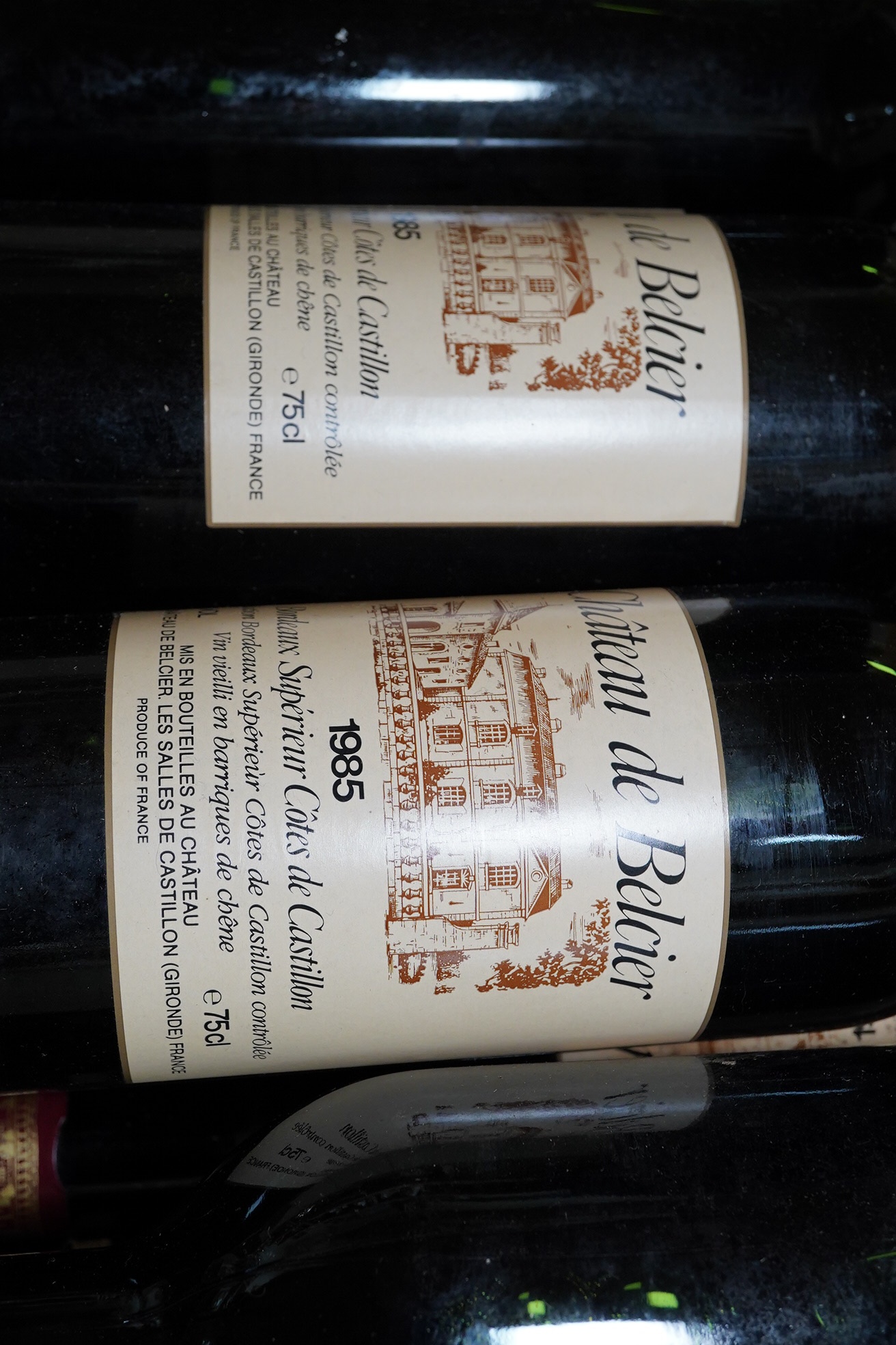 Vintage wine comprising Chateau De Belcier, Cotes de Castillion, six bottles 1985 and eleven bottles 1986 (17). Condition - fair to good, storage history unknown